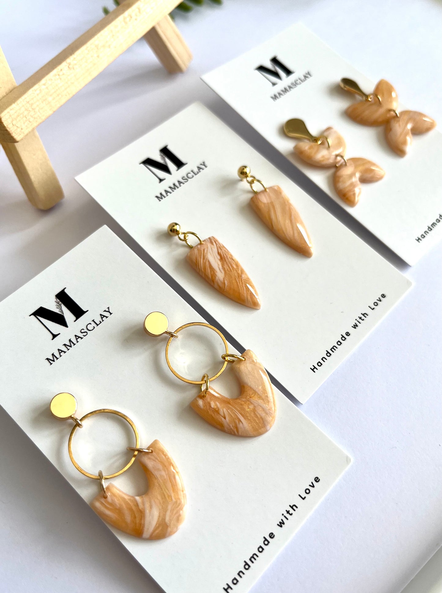 Golden Marble Shield Dangles